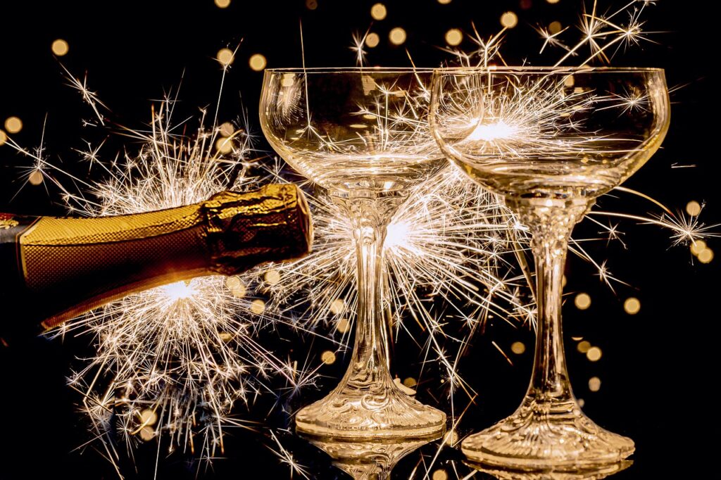 champagne glasses, champagne bottle, spray candle-4732068.jpg